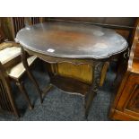 Early twentieth century stained two-tier occasional table together with set of four carved back