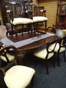 An antique mahogany extending dining table, 237x120wx75hcms, with winding mechanism (winder with