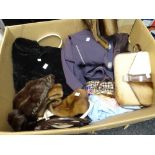 A vintage parcel of handbags, fabrics, dresses, stoles ETC Condition Report: please request via