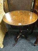 An antique elm circular top tripod table, 70cm high Condition Report: please request via email.