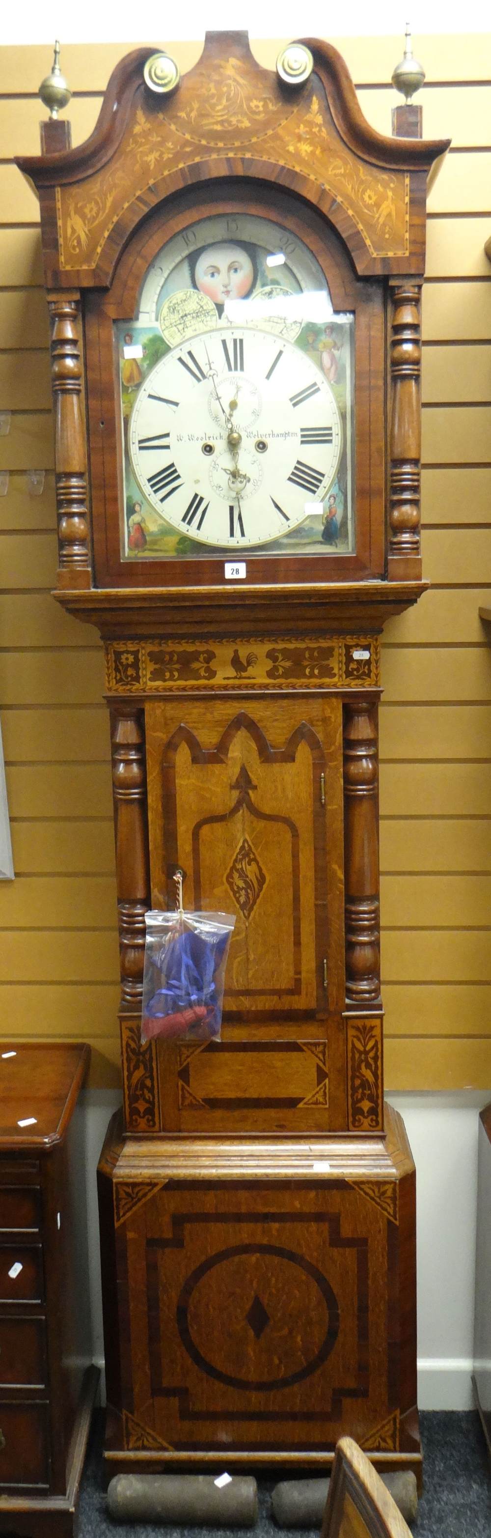 A good nineteenth century marquetry encased eight-day longcase clock with unusual marquetry with