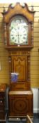 A good nineteenth century marquetry encased eight-day longcase clock with unusual marquetry with