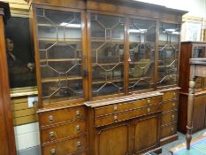 Good large reproduction breakfront bookcase secretaire having a configuration of four astragal glaz