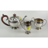 A three-piece silver tea service with bead decorated border, Birmingham 1969 / 1973, 24.7oz