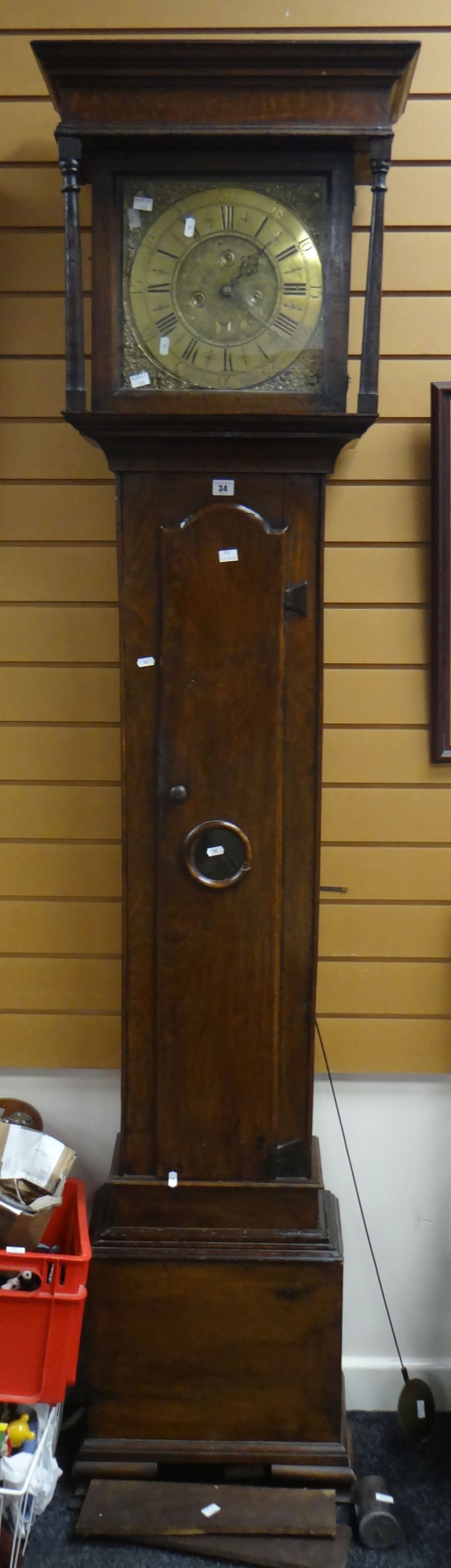 A George II oak encased brass dial longcase clock with Roman numeral chapter ring & with inscription