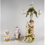 A pair of continental figures & similar figural candlestick group (damage) Condition Report: