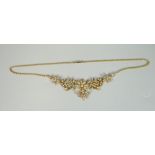 15CT YELLOW GOLD SEED PEARL PENDANT ON CHAIN, the five section pendant of floral and foliate