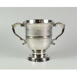 GEORGE II SILVER TWIN HANDLED CUP OR LOVING MUG, raised on circular base with engraved initials "B S