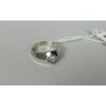 18K WHITE GOLD DIAMOND SOLITAIRE RING, the round brilliant cut diamond approximately 0.10cts,