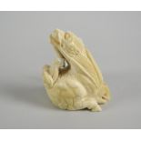 CHINESE CARVED IVORY NETSUKE STUDY OF A QILIN (MYTHOLOGICAL DRAGON BEAST) with signature to leg,