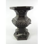 CHINESE BRONZE HEXAGONAL VASE raised on three lion dog mask feet, on hexagonal platform base,