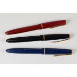 THREE VINTAGE PARKER SLIMFOLD FOUNTAIN PENS each with an original 14ct nib & gold plated trim, one