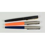 THREE MODERN PARKER '15' FOUNTAIN PENS one each of blue & neon orange - both with stainless steel