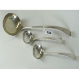 LARGE GEORGE V SILVER LADLE together with a pair of smaller silver ladles. All Sheffield 1924, W S