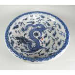CHINESE PORCELAIN BLUE & WHITE BOWL depicting five claw dragon chasing a flaming pearl within