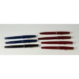 SEVEN VINTAGE PARKER 17 FOUNTAIN PENS one black, two blue, four red, all with gold trim also one red