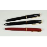 THREE VINTAGE DUOFOLD FOUNTAIN PENS two juniors (1 red, 1 black) & one senior (black), all with