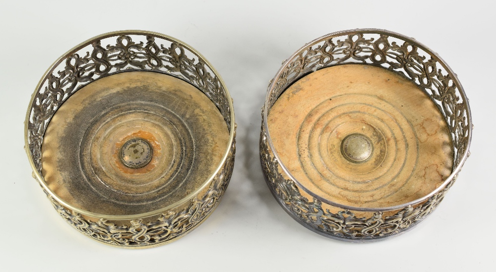 PAIR OF PIERCED SILVER PLATED BOTTLE COASTERS, having turned wooden bases. 14cm diameter. (2) - Image 2 of 2