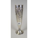 A CONTINENTAL (BELIEVED) SILVER TRUMPET VASE with raised floral decoration, not hallmarked,