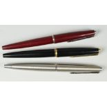 THREE VINTAGE PARKER 45 FOUNTAIN PENS one black 45 DeLuxe, one red 45 CT, one flighter & silver tail