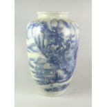 CHINESE PORCELAIN BLUE & WHITE CYLINDRICAL VASE depicting pagodas, figures on a bridge in