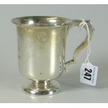 GEORGE V SILVER CHRISTENING MUG raised on circular foot with flared rim, engraved initials and dated