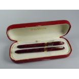 MODERN FLAME RED SHEAFFER CREST (REISSUE) FOUNTAIN PEN & ROLLERBALL SET in red laque finish in the
