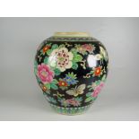 ORIENTAL PORCELAIN FAMILLE NOIR BALUSTER GINGER JAR decorated with butterflies & floral sprays,