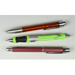 THREE MODERN PARKER PENS including one lime green Parker Contact ballpoint pen, one aubergine Parker