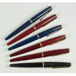 SIX VINTAGE PARKER 45 DELUXE FOUNTAIN PENS all with gold trim; one black, two blue & three red