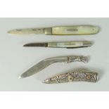 TWO MOTHER OF PEARL HANDLED FRUIT KNIVES, one with silver blade (Sheffield), together with a white