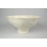 CHINESE BLANC DE CHINE LIBATION CUP decorated with various animals & trees, unmarked, 8cms high