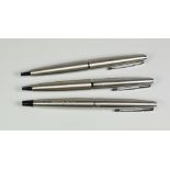 THREE STAINLESS STEEL PARKER 45 BALLPOINT PENS one early original Flighter with black plastic tail