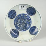 CHINESE PORCELAIN BLUE & WHITE SHALLOW DISH depicting three clawed dragon within clouds,