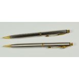 TWO MODERN PARKER INSIGNIA PENCILS push button actuated, one stainless steel with Dimonite G gold