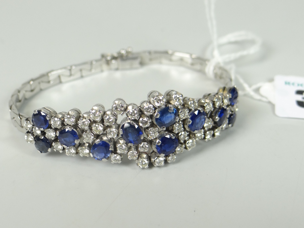 18CT WHITE GOLD SAPPHIRE & DIAMOND LADIES BRACELET the eleven sapphires surrounded by forty-seven - Image 2 of 2