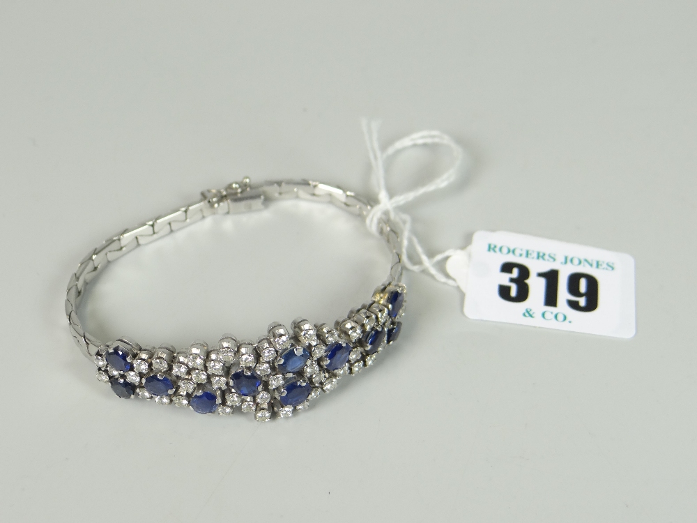 18CT WHITE GOLD SAPPHIRE & DIAMOND LADIES BRACELET the eleven sapphires surrounded by forty-seven