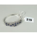 18CT WHITE GOLD SAPPHIRE & DIAMOND LADIES BRACELET the eleven sapphires surrounded by forty-seven