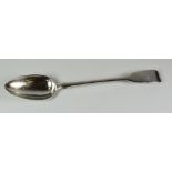 WILLIAM IV SILVER BASTING SPOON, of fiddle pattern with engraved initials. London 1833, rubbed