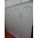 Pair of cream French style double wardrobes with top storage cabinets