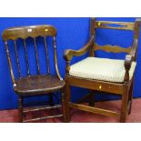 An antique oak farmhouse armchair & a spindle back example with double stretchers