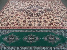 Cream ground floral patterned carpet with red border, 220 x 202 cms approx
