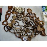 A large quantity of Celtic and other wooden love spoons