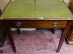 A single-drawer mahogany writing desk with cream gilt tooled leather top & tapering square supports