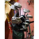 A set of Premiere golf clubs in carry bag with associated trolley