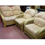 A good wicker three-piece conservatory suite with upholstered cushion seats & backs