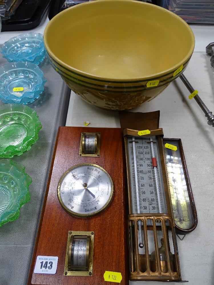 A Williams-Sonoma Christmas themed mixing bowl, vintage barometer and thermometers