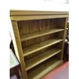 A good quality antique-style pine open bookcase