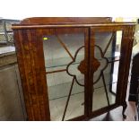 A vintage two-door china display cabinet