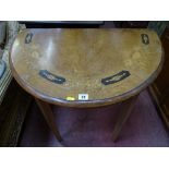 An inlaid walnut side table